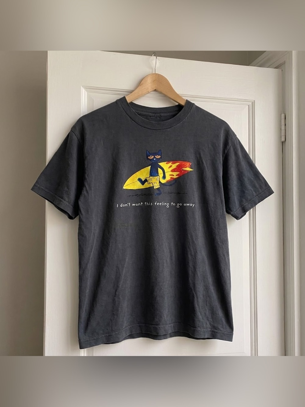 Pete The Cat Surfing I Don’t Want This Feeling To Go Away Black Graphic T-Shirt